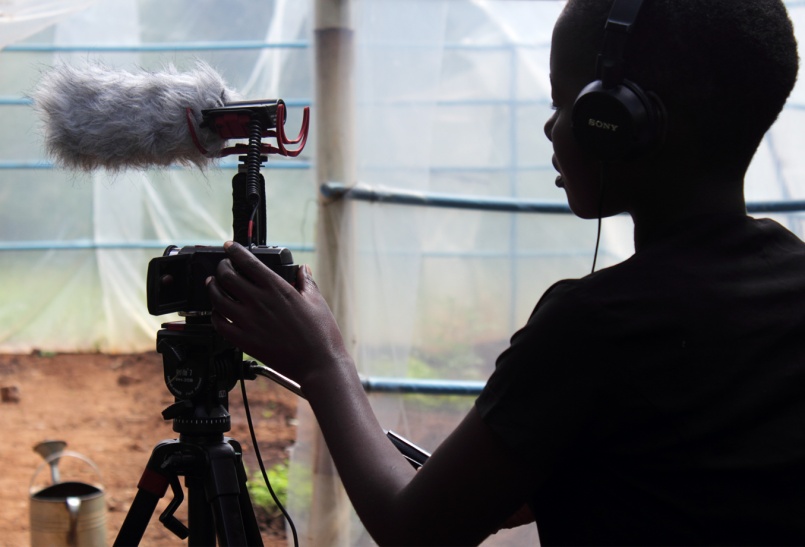 Fanny filming at the Kusamala greenhouse Fanny filming at Kusamala greenhouse